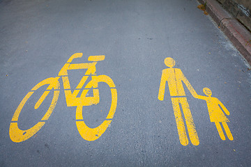 Image showing Bicycle signs painted on asphalt