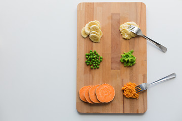 Image showing mashed fruits and vegetables with forks on board