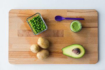 Image showing vegetable puree or baby food on wooden board