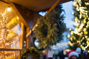 Image showing close up of fir tree wreath at christmas market