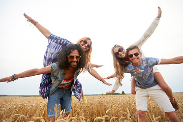 Image showing happy hippie friends having fun on cereal field