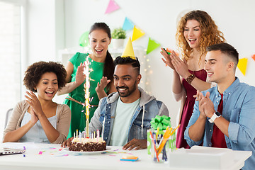 Image showing team greeting colleague at office birthday party