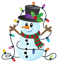 Image showing Snowman with Christmas lights image 1