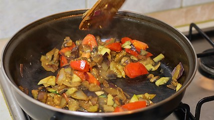 Image showing Preparing hot breakfast