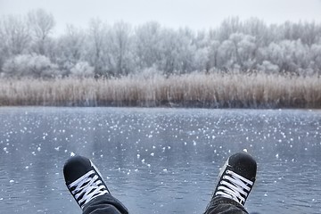 Image showing Skating on a lake