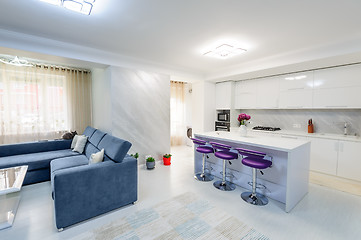 Image showing Interior of modern white studio apartment with kitchen