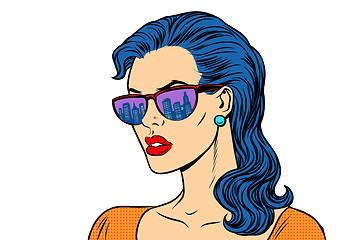 Image showing Woman in sunglasses with the reflection city