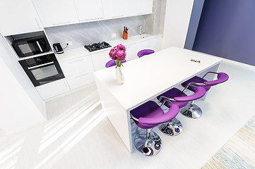 Image showing white dining table in modern kitchen