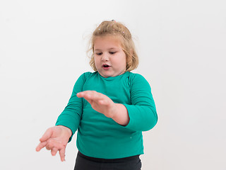 Image showing kid blowing confetti