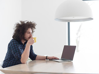 Image showing man working from home