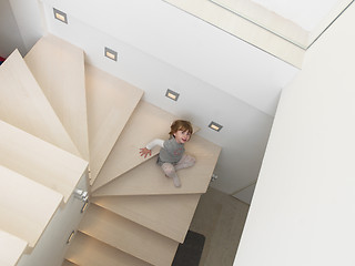 Image showing little cute girl enjoying on the stairs