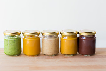 Image showing vegetable or fruit puree or baby food in jars