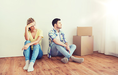 Image showing unhappy couple having argument at home