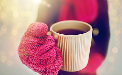 Image showing close up of woman with tea mug outdoors in winter