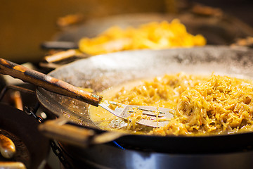 Image showing braised cabbage or sauerkraut in wok or frying pan