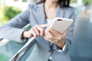 Image showing Businesswoman using cellphone