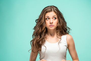 Image showing Portrait of young woman with shocked facial expression