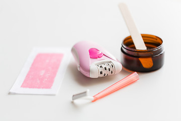 Image showing safety razor, epilator, hair removal wax and patch