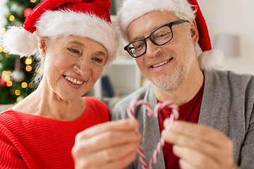 Image showing close up of happy senior couple at christmas