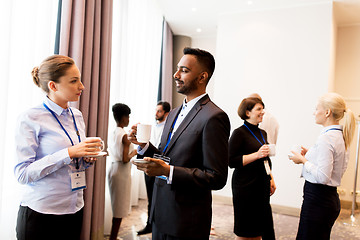 Image showing happy business team at international conference