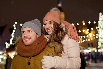 Image showing happy couple hugging at christmas market