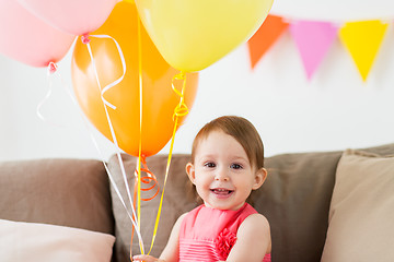 Image showing happy baby girl on birthday party at home