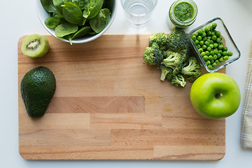 Image showing vegetable puree or baby food and fruits on board