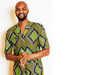 Image showing portrait of young handsome african man wearing bright green nati