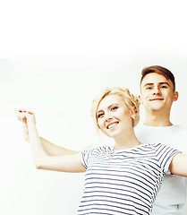 Image showing young pretty teenage couple, hipster guy with his girlfriend hap