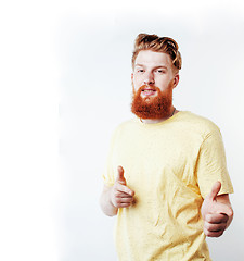 Image showing young handsome hipster ginger bearded guy looking brutal isolate