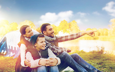 Image showing happy family with tent at camp site