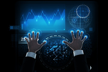 Image showing close up of businessman hands with virtual screen