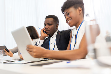 Image showing team with tablet pc at business conference