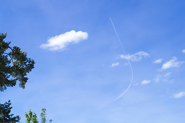 Image showing plane with a bent contrail