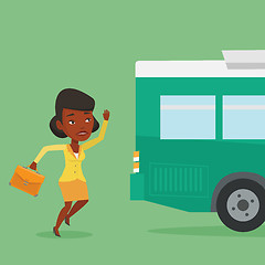 Image showing Latecomer woman running for the bus.