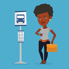 Image showing Woman waiting at the bus stop vector illustration.