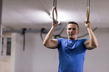 Image showing man doing dipping exercise