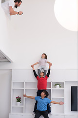 Image showing young boys posing line up piggyback