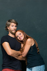 Image showing The young couple with different emotions