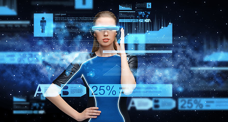 Image showing woman in virtual reality 3d glasses with charts