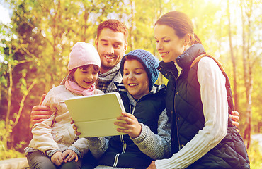 Image showing happy family with tablet pc at camp