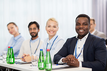 Image showing happy business team at international conference