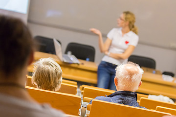 Image showing Instructor teaching first aid cardiopulmonary resuscitation workshop.