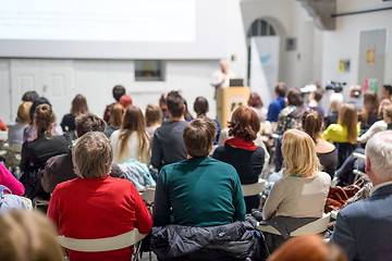 Image showing Man giving presentation in lecture hall at university.