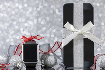 Image showing Smartphone and smartwatch for Christmas