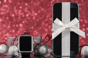 Image showing Smartphone and smartwatch for Christmas