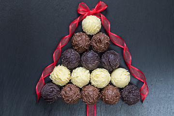 Image showing Chocolate Christmas tree on black 