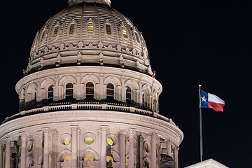 Image showing Flags Fly Night Falls Austin Texas Capital Building Motion