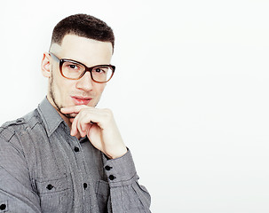 Image showing young handsome teenage hipster guy posing emotional, happy smiling against white background isolated, lifestyle people concept 