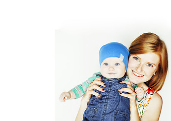 Image showing young beauty mother with cute baby, red head happy modern family